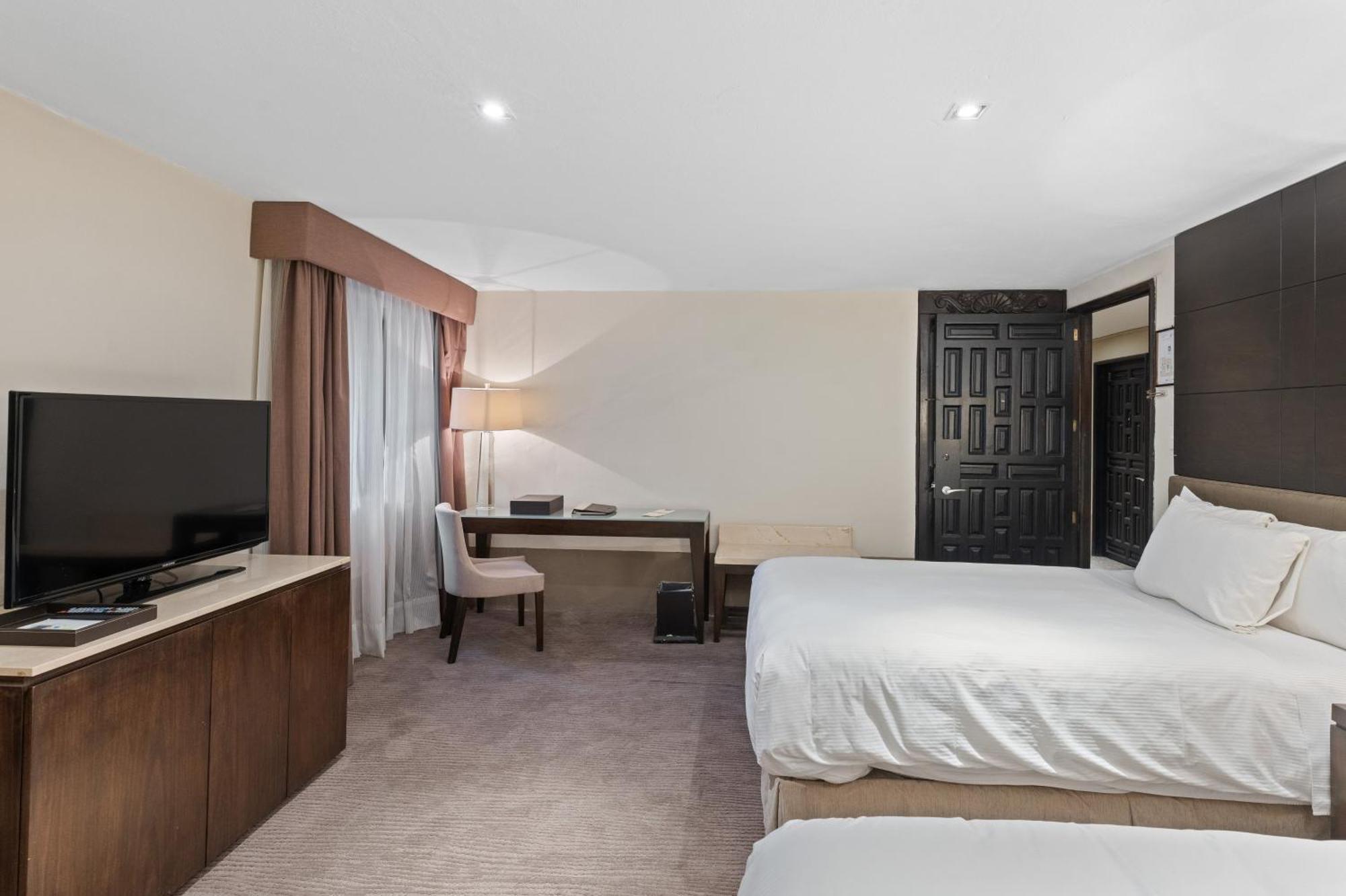 Quinta Real Puebla Hotel Exterior photo A guest room at the Hilton Garden Inn